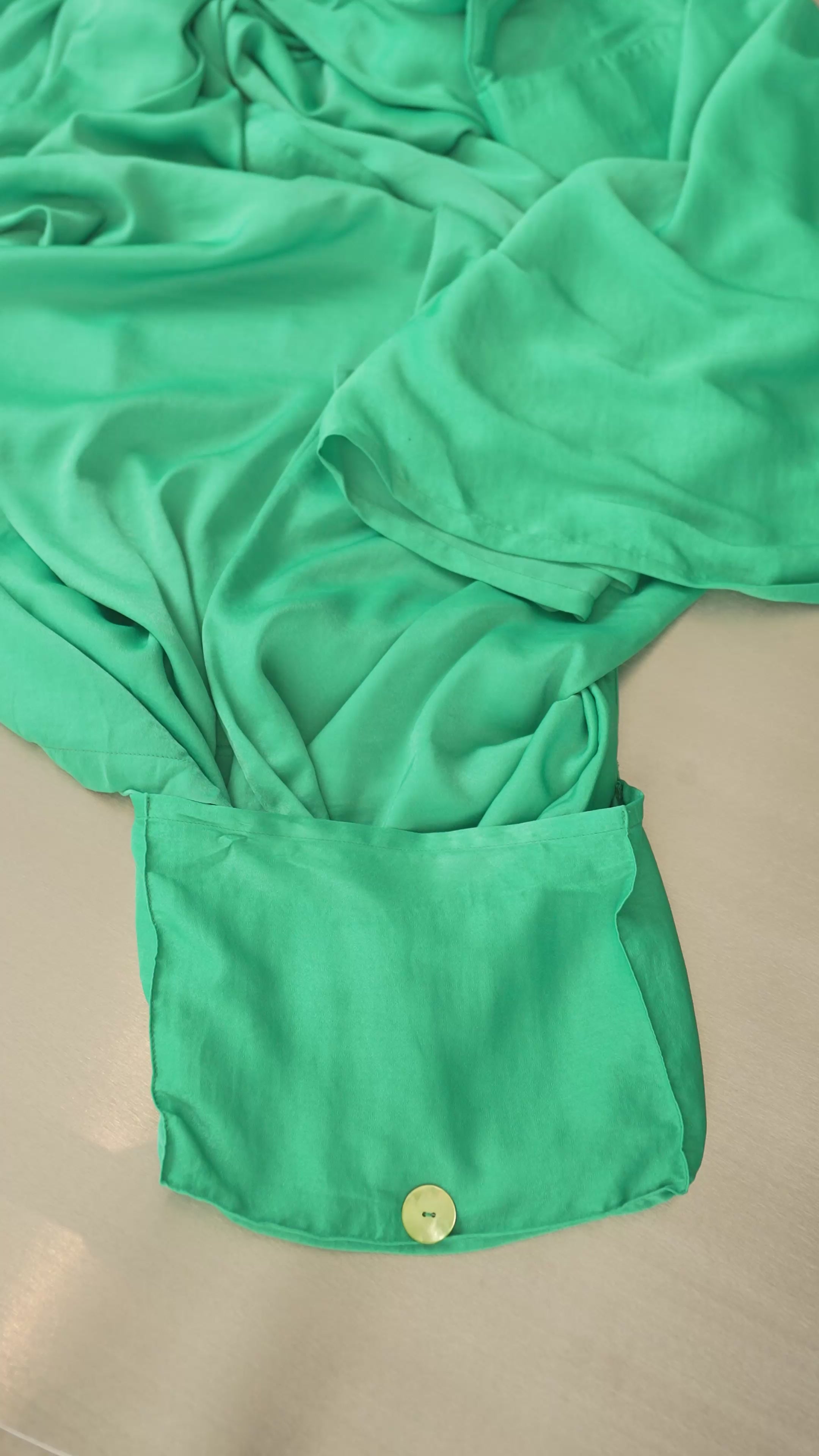 Load video: How to fold your Ghata